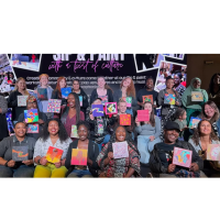 People showing their paintings