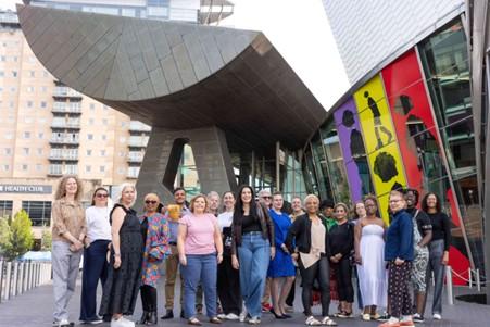 A group of people outside The Lowry 