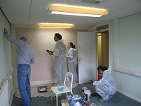IGT volunteers painting